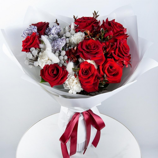 Red rose 50 cm - 9, Alstromeria Red, Bright Pink - 6, Carnation white, cream - 3, Carnation white, cream - 7, Pistachio, Dried flowers in assortment, Solidago (1 pc.), Wrapping Paper, Brunia Green Lanuginosa (1 pc.)