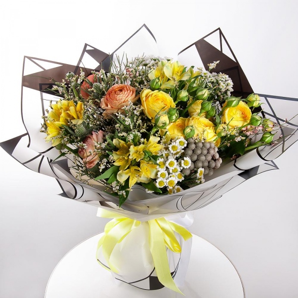 Peony sprayrose - 2, Ranunculus Pink - 3, Alstromeria Yellow, Orange - 5, Santini White Spray Chrysanthemum - 4, Brunia Green Lanuginosa (1 pc.), Eryngium, Limonium (1 pc.), Genista, Wrapping Paper