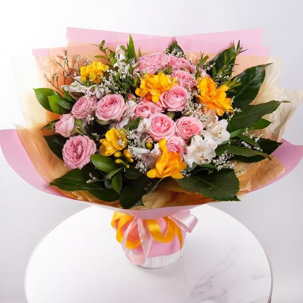 Bright pink spray rose mix, 50 cm - 5, Freesia - 6, Alstromeria white, soft pink - 7, Limonium (1 pc.), Pistachio, Fatsia (1 pc.), Wrapping Paper