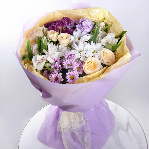Bacardi White Spray Chrysanthemum - 1, Daisy poms Santini pink, purple - 1, Alstromeria white, soft pink - 5, Matthiola Lilac - 1, Spray rose: white, cream, light pink 50 cm - 2, Spray Chrysanthemum Newton purple - 1, Wrapping Paper