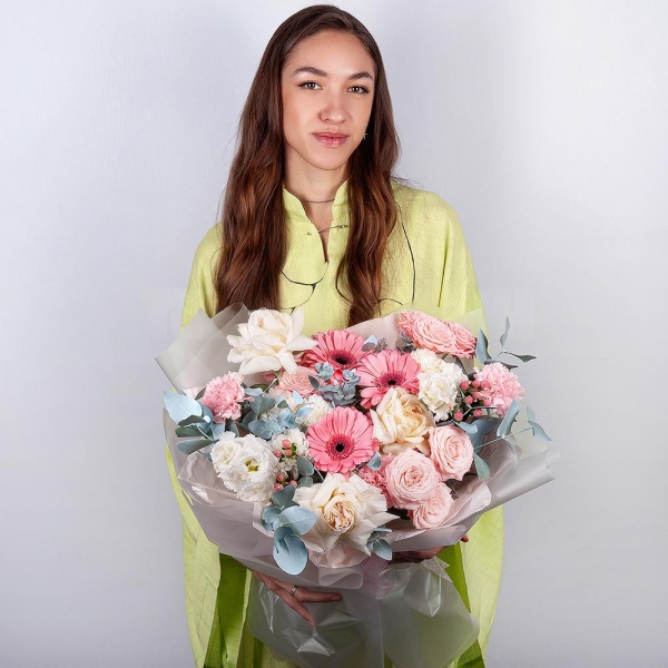 Gerbera pink - 3, Peony style roses - 3, Baltica White Spray Chrysanthemum - 1, lisianthus - 2, Pink carnation - 7, Peony sprayrose - 3, Hypericum, Eucalyptus, Wrapping Paper